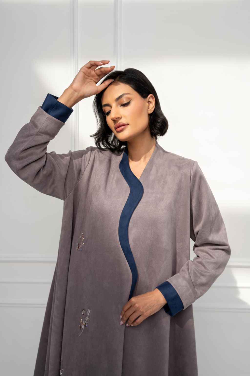 Selected Lines high quality fashion statement abaya in soft gray with navy blue accents and elegant embroidery