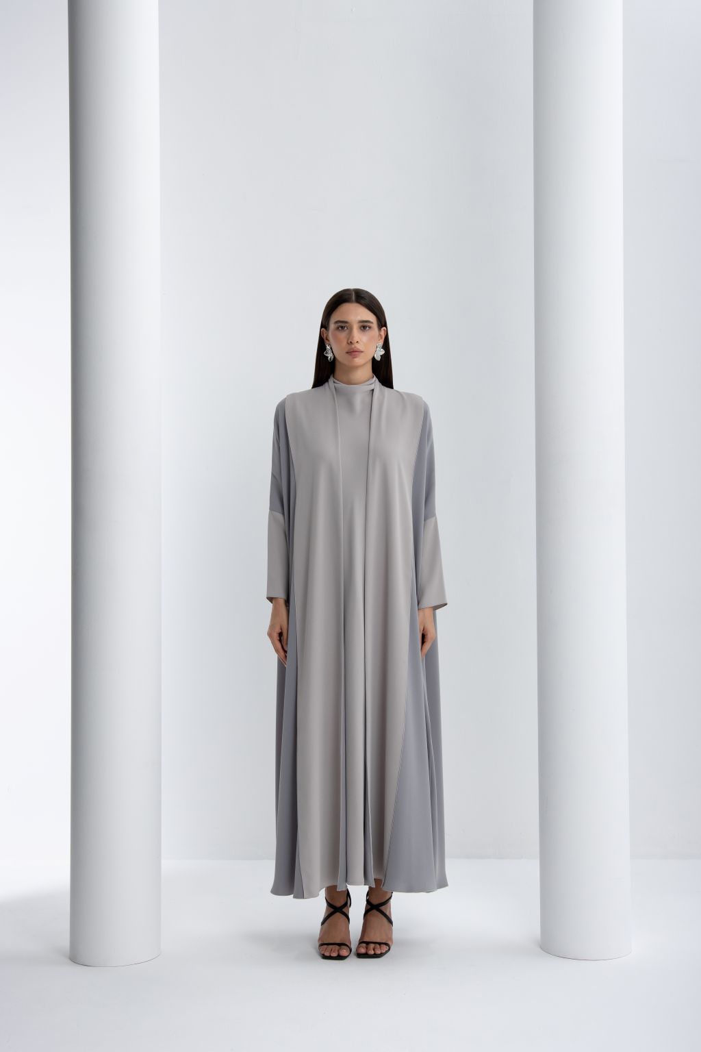 Elegant gray high quality formal abaya with long sleeves and a flowy design, perfect for special occasions