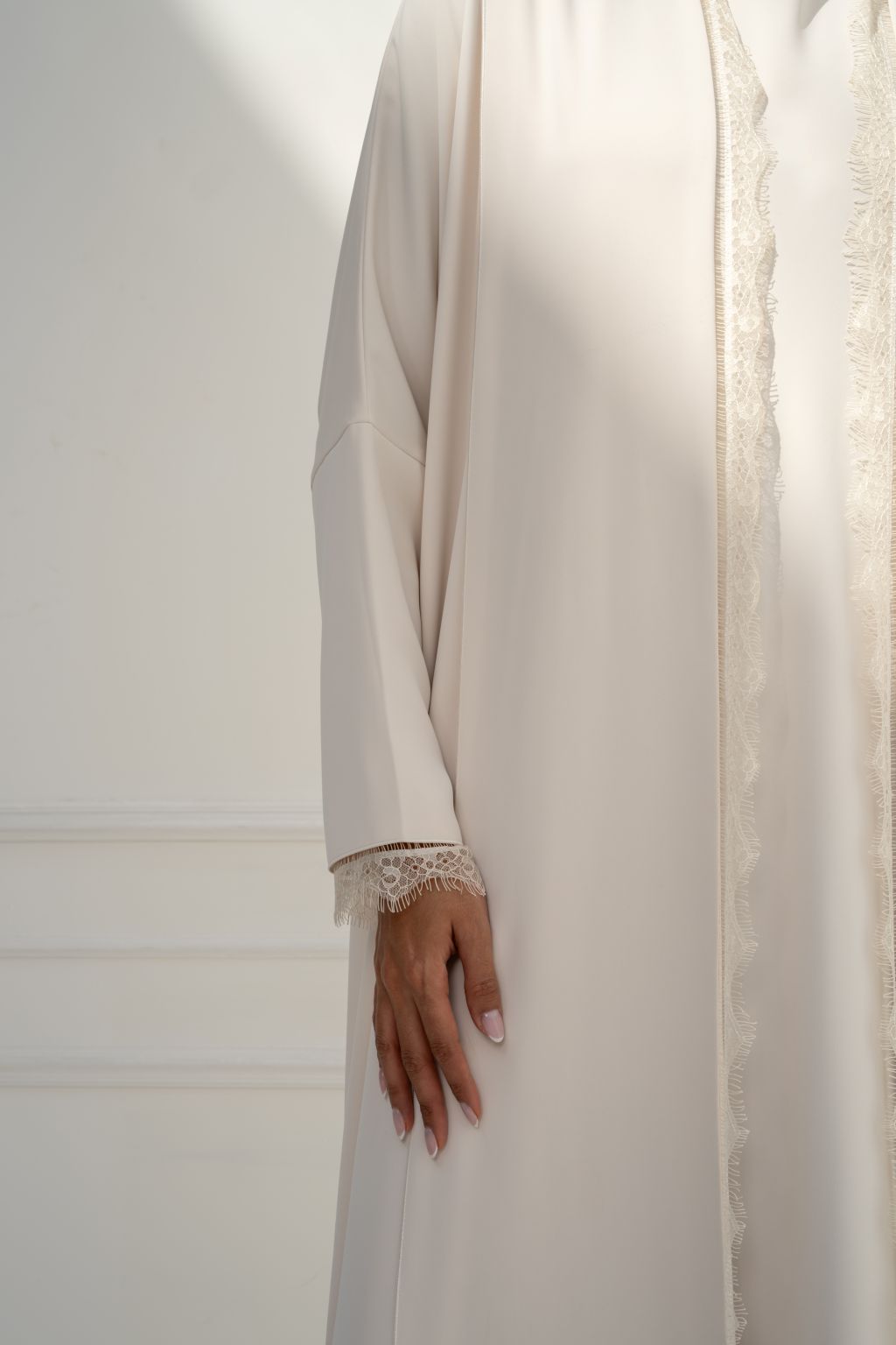 Selected Lines ivory abaya for women with delicate lace trim and elegant design perfect for any occasion