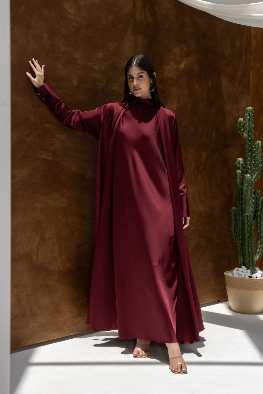 Selected Lines luxury abaya dress for women in deep burgundy with long sleeves and flowing design