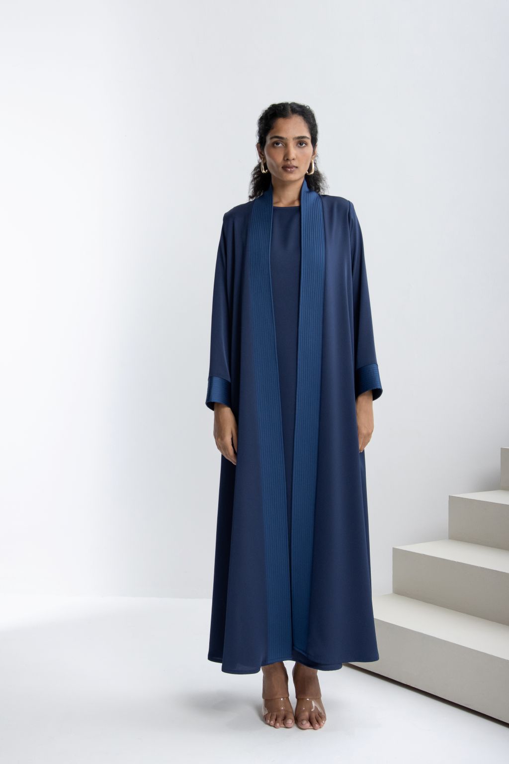 Elegant navy luxury abaya for women featuring a modern design and flowing silhouette