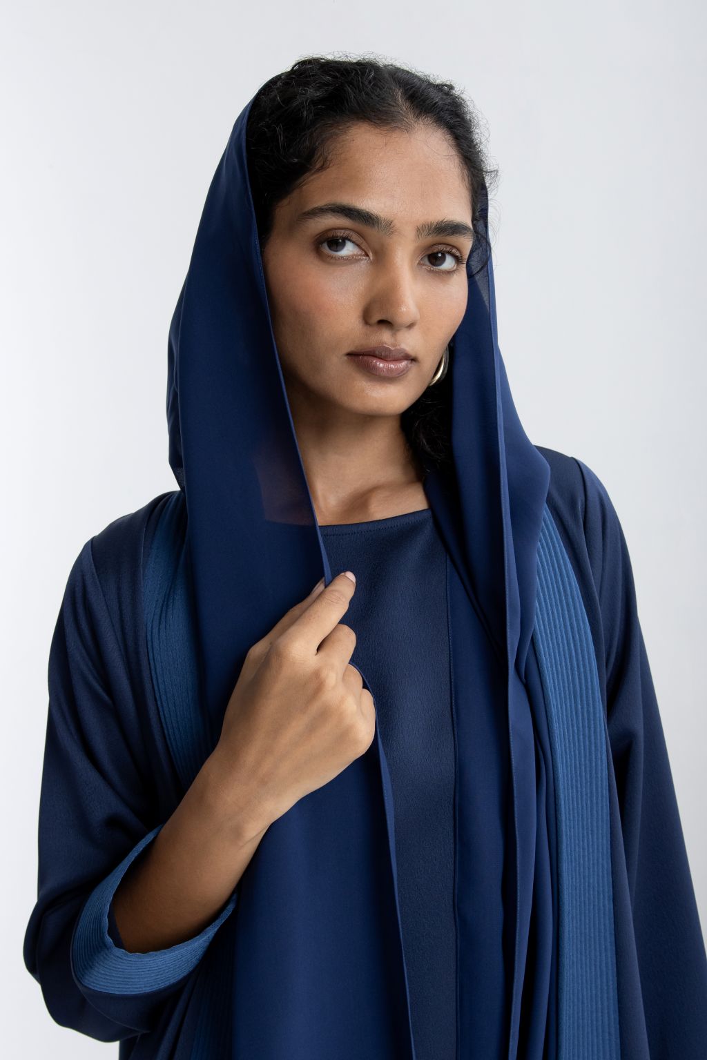Elegant navy Selected Lines luxury abaya for women with elegant draping and matching hood