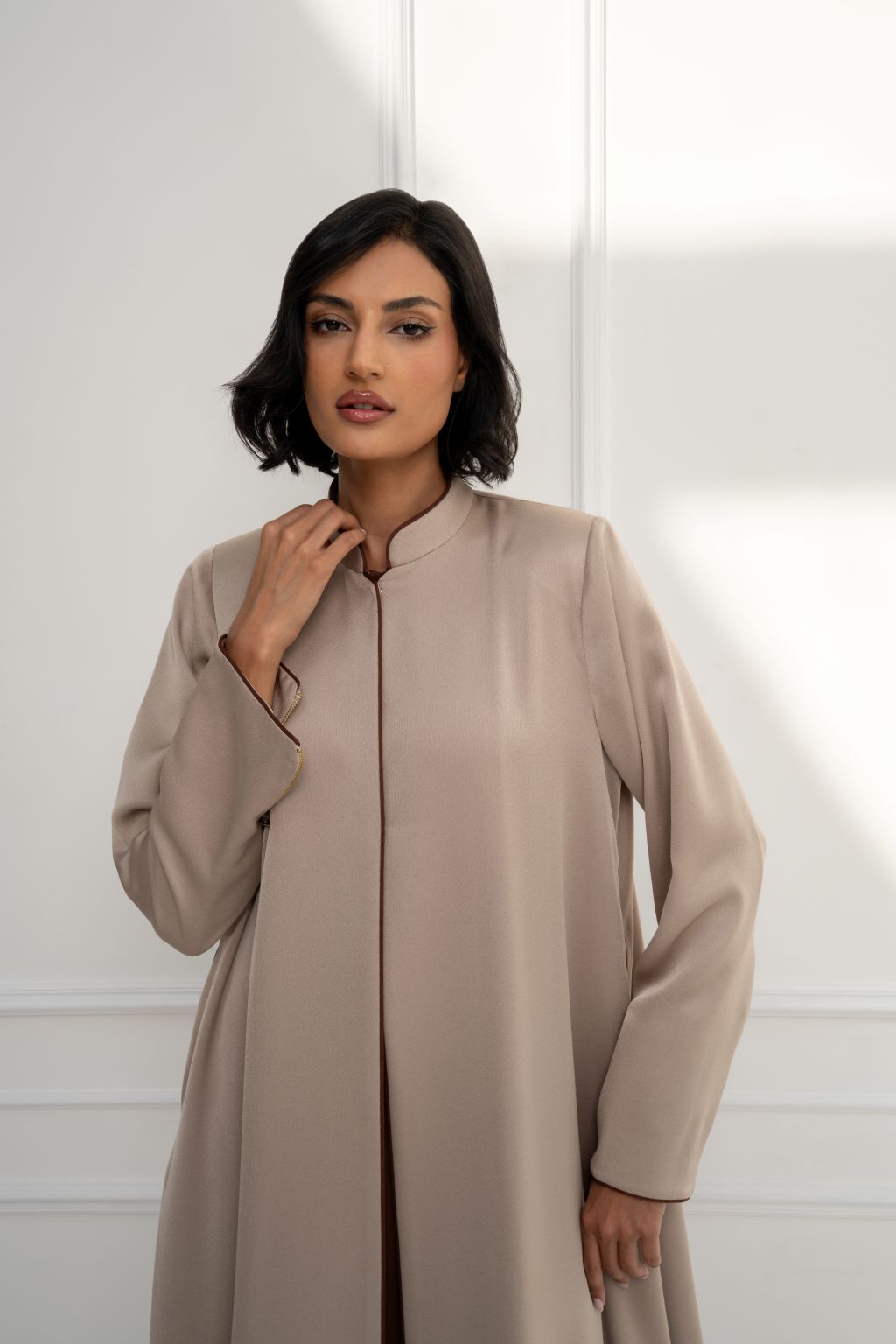 Selected Lines luxury beige long coat for women featuring a sleek design and high collar for elegant style