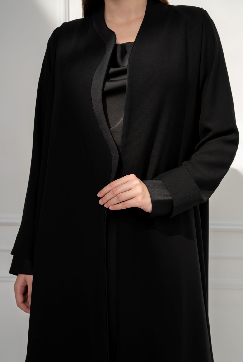 Selected Lines luxury black abaya with sleek design and elegant silhouette for modern style.