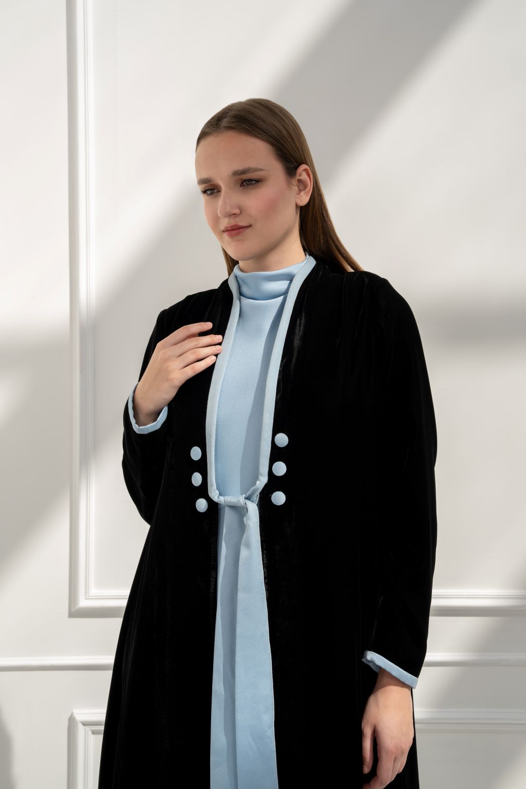 Selected Lines luxury black abaya with blue inner dress and elegant button detailing for a refined look