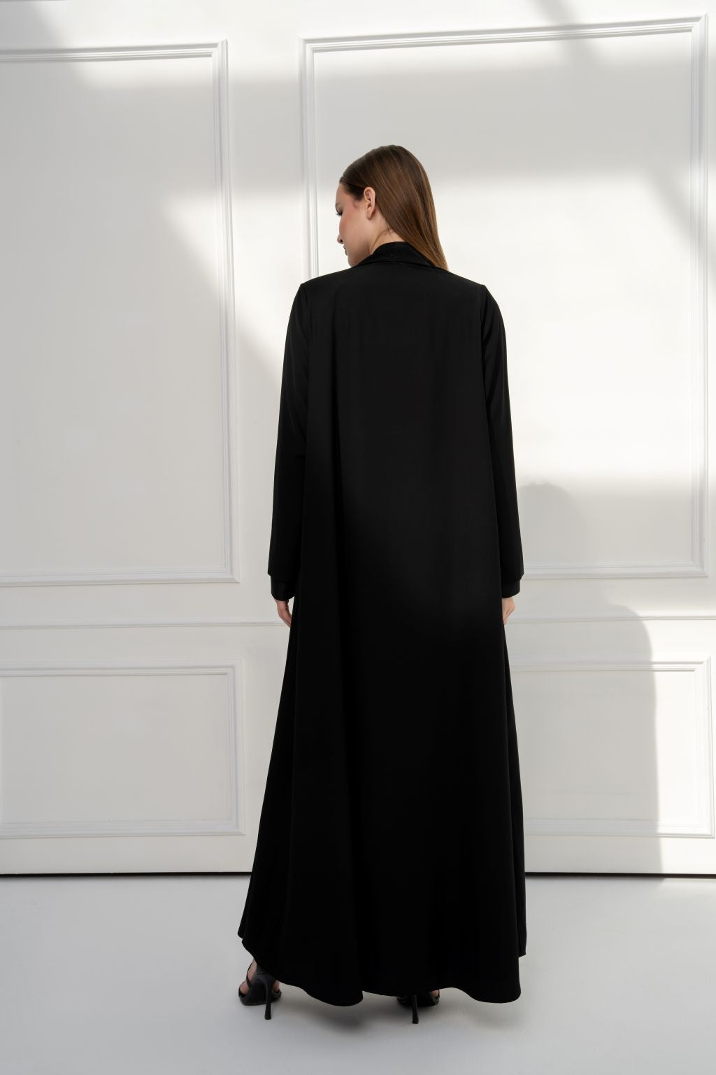 Selected Lines luxury black abaya with elegant design and full-length silhouette for sophisticated style.