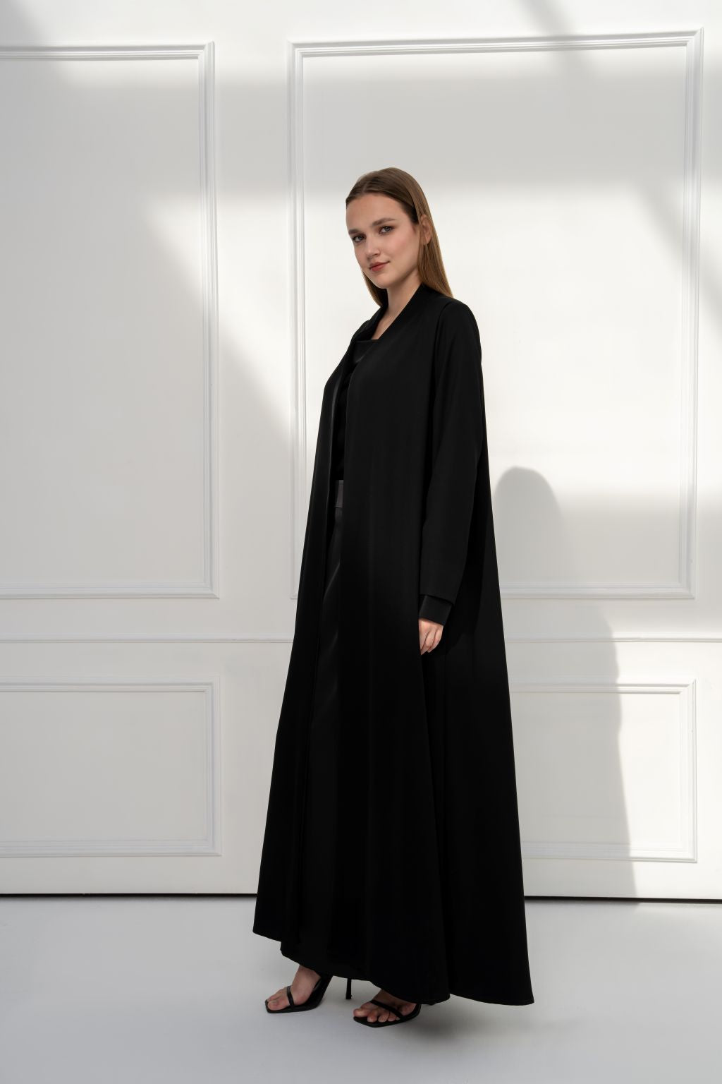 Selected Lines luxury black abaya with elegant design and long, flowing silhouette for a sophisticated look