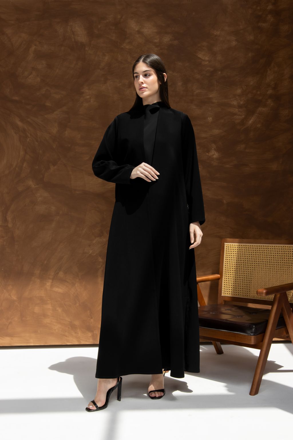 Luxury black abaya with hidden pockets designed for elegance and comfort in any setting