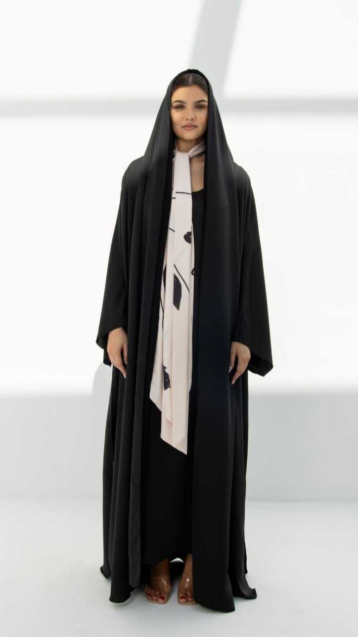 Elegant luxury black hoodie abaya with a flowing design and stylish hood
