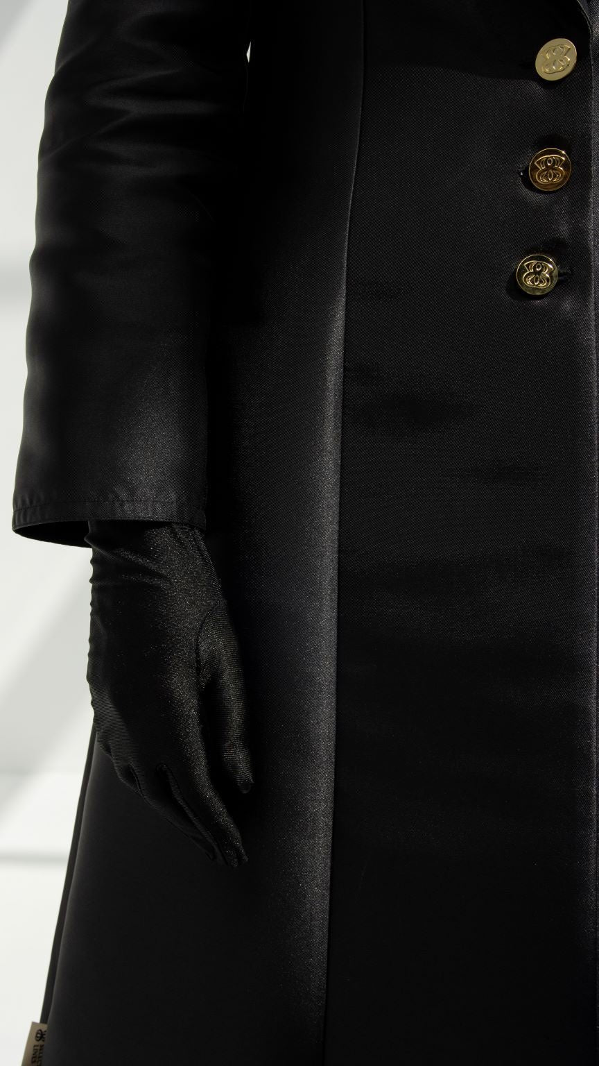 Selected Lines luxury coat abaya in black with gold buttons and textured fabric sleeve detail