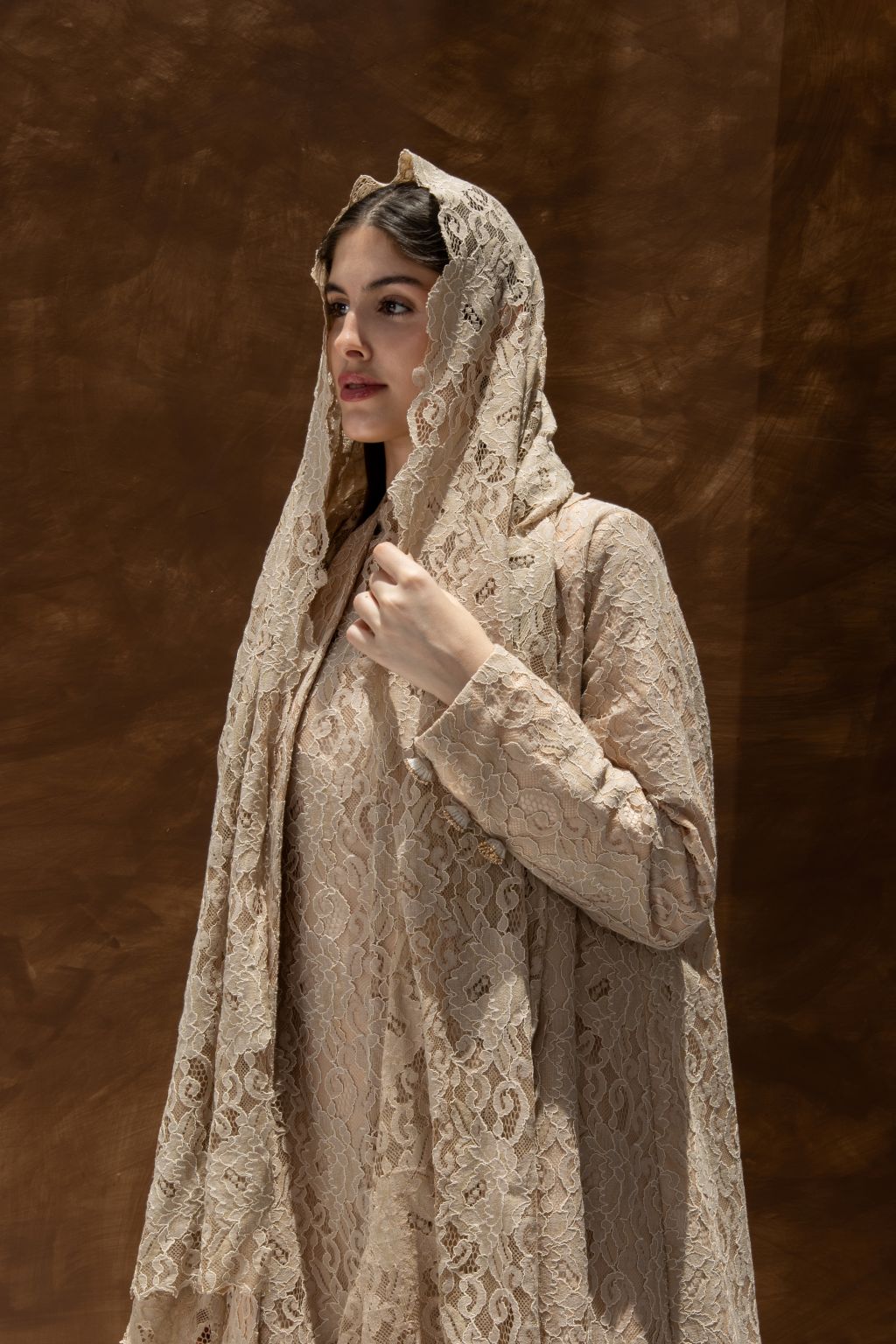 Selected Lines luxury lace Duntel Enchante' abaya in beige with intricate lace detailing and hooded design
