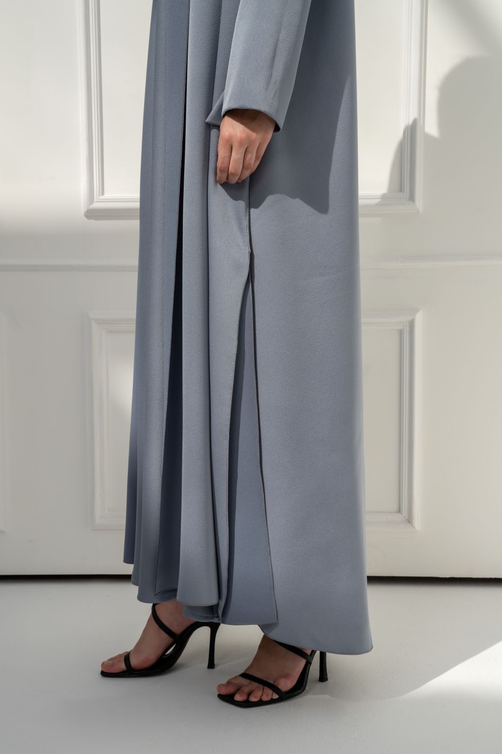 Selected Lines luxury modest dress for women in soft gray with elegant flowy design and side slits