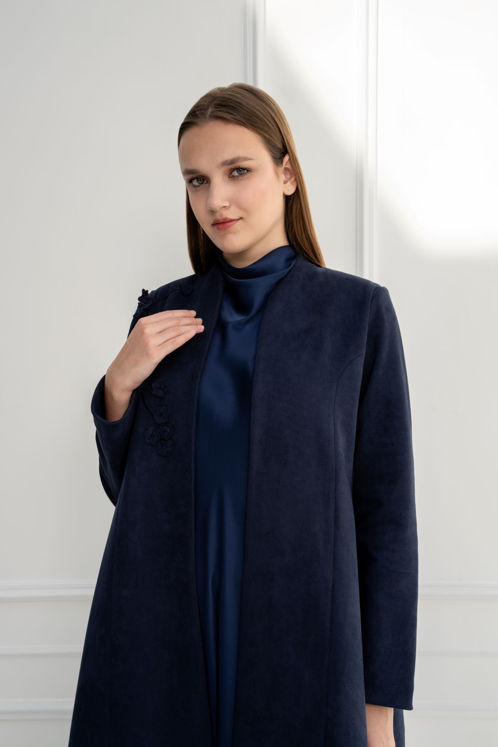 Selected Lines luxury navy blue Shamwa abaya featuring a sleek design and elegant silhouette for modern styling.