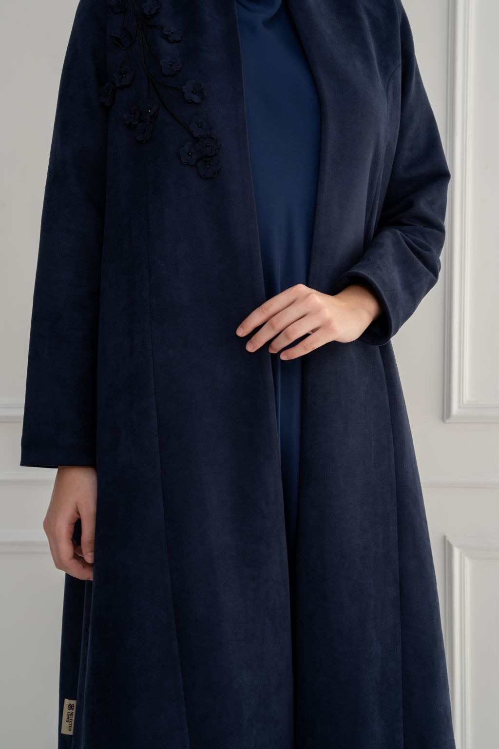 Selected Lines luxury navy blue Shamwa abaya with elegant floral embroidery and flowy design for chic style.
