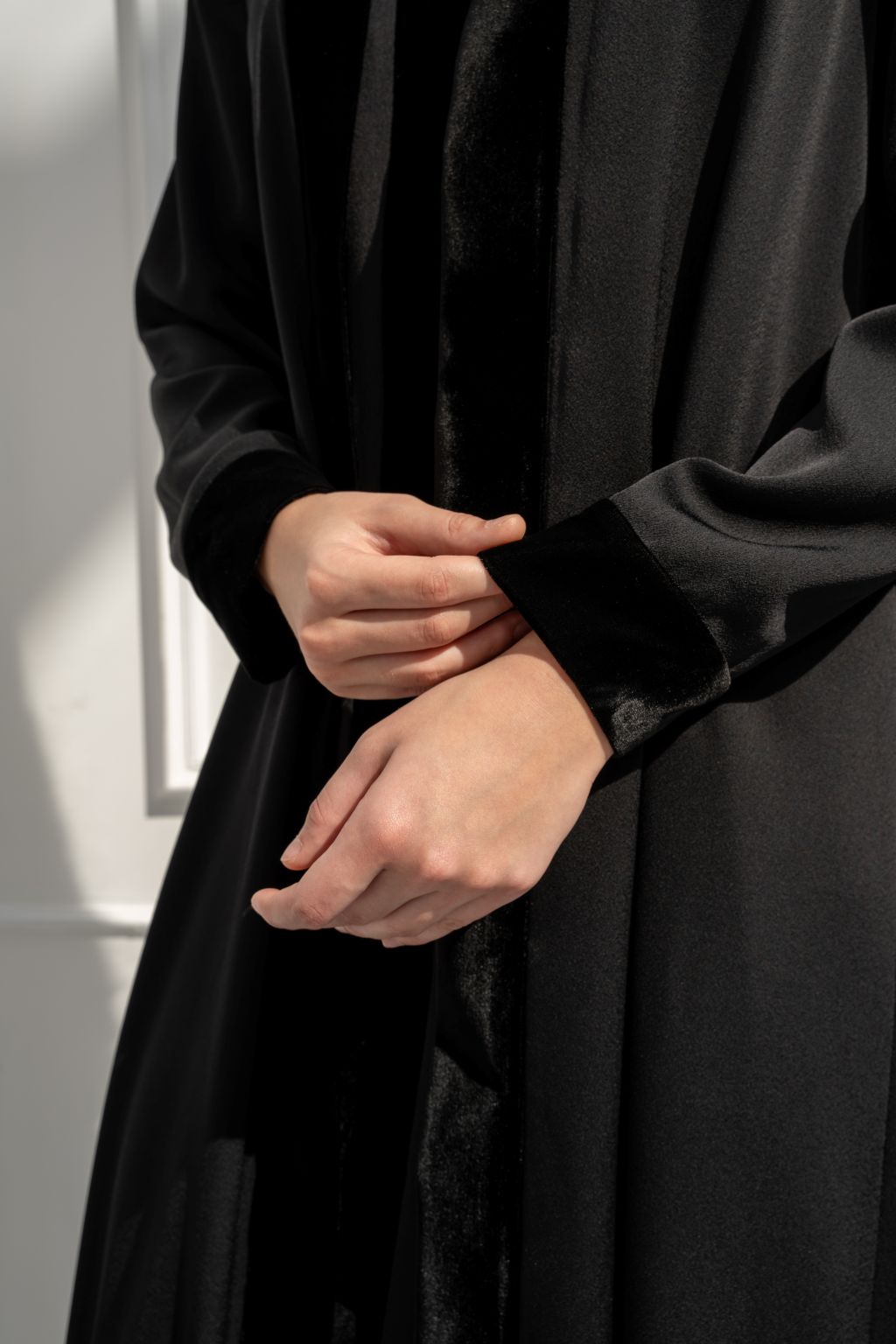 Selected Lines luxury velvet abaya in black with soft sheen and elegant design for sophisticated style.
