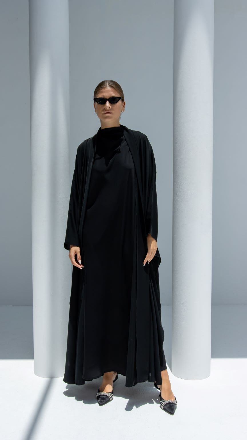 Elegant Mermaid Stitch Abaya in black, featuring a flowing design and modern silhouette for stylish wear
