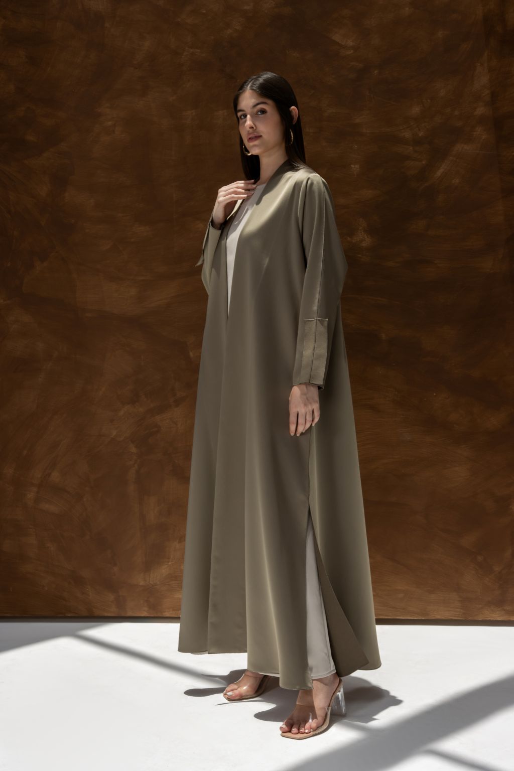 ModiSquare luxury abaya for women by Selected Lines in olive green with long sleeves and side slits