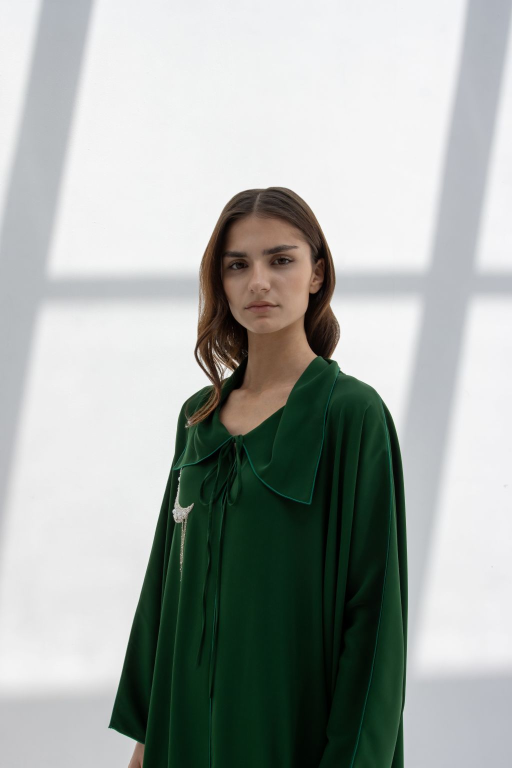 Elegant green Radaman Dress 2025 with a stylish collar and graceful silhouette for modern fashion