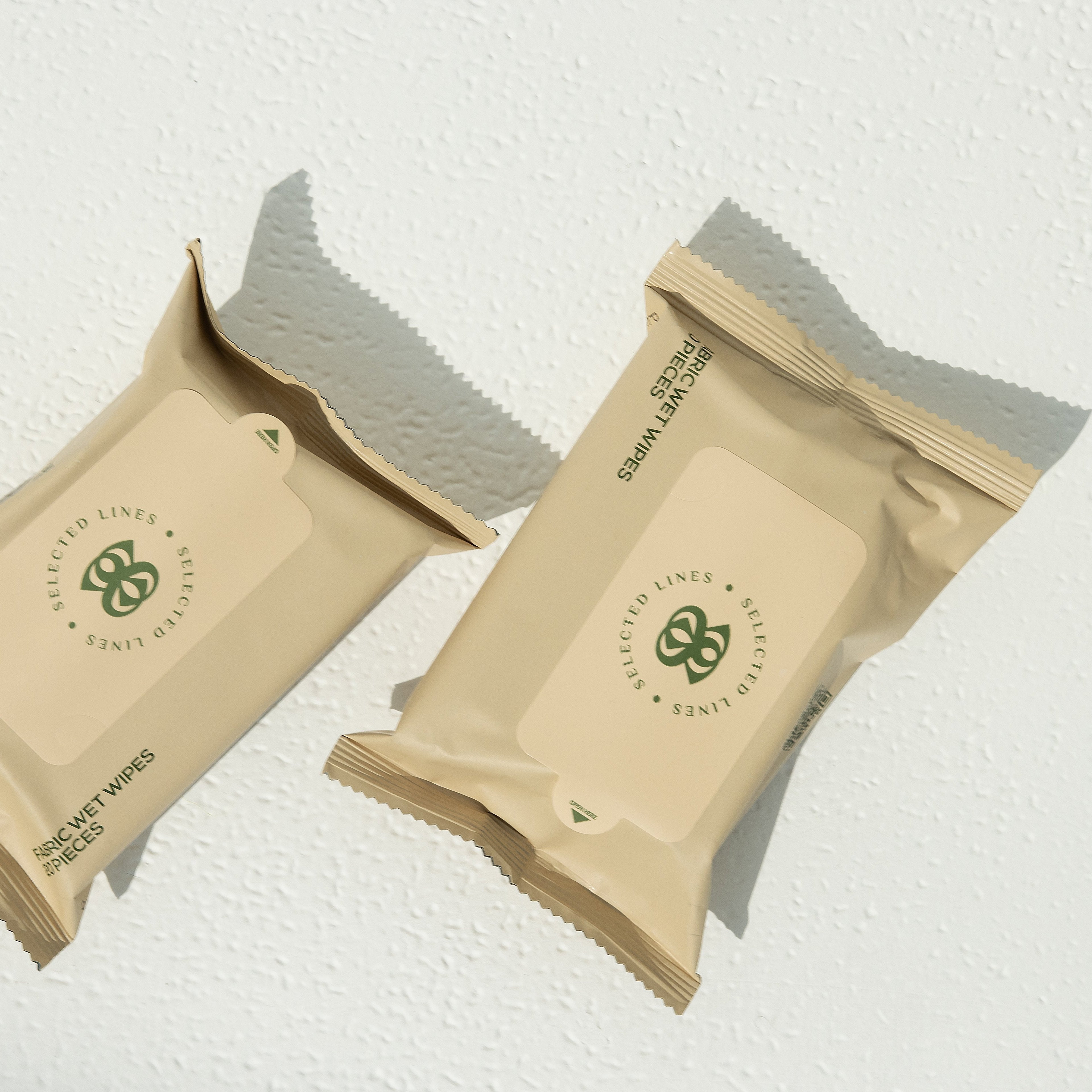 Selected Lines high quality wet wipes packaging on a textured white background