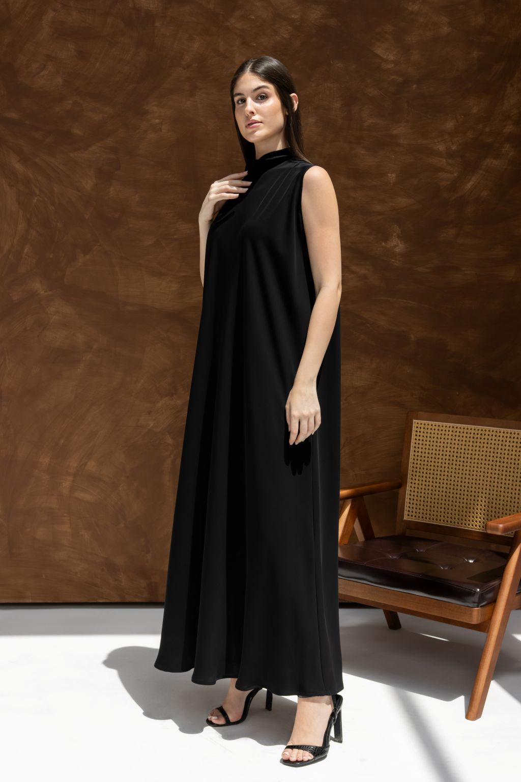 Selected Lines black Small Neck Dress inner dress with sleeveless design worn by model