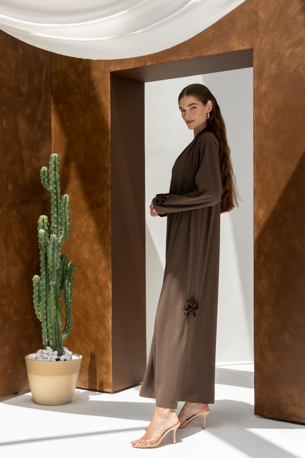 Selected Lines brown abaya featuring timeless modest evening wear design with long sleeves and elegant fit