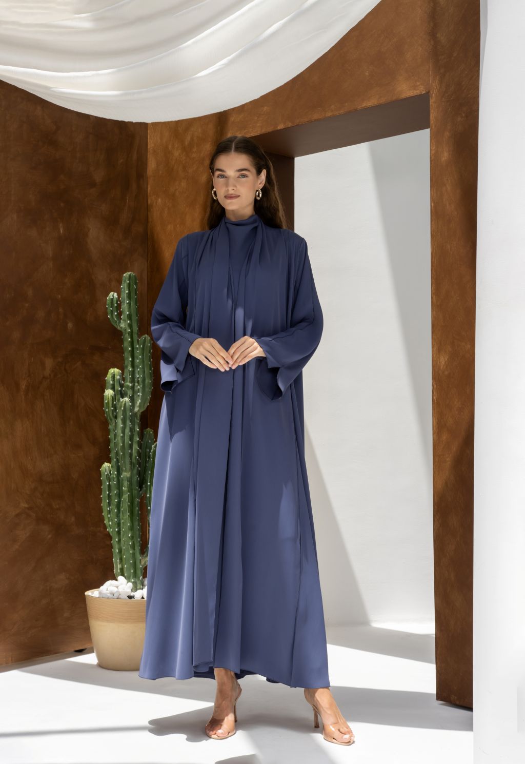 Selected Lines elegant long sleeve dress abaya in navy blue with a high neckline and flowing design